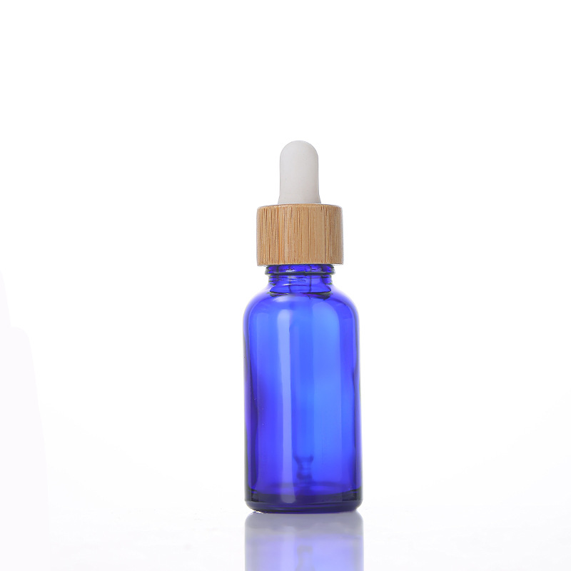 High Quality 30ml Frosted Glass Dropper Bottles with Natural Beech Wood Bamboo Lid for Essential Oil Serum Cosmetic Packaging High Quality 30ml Frosted Glass Dropper Bottles with Natural Beech Wood Bamboo Lid for Essential Oil Serum Cosmetic Packaging
