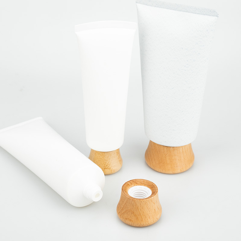 Custom Empty Matte White Cosmetic Squeeze Tube with Natural Bamboo Screw Cap for Face Wash Hand Cream Sunscreen Container Custom Empty Matte White Cosmetic Squeeze Tube with Natural Bamboo Screw Cap for Face Wash Hand Cream Sunscreen Container