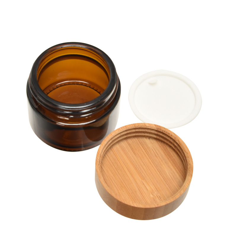 High-quality 30ml Glass Skin Care Cream Jar with Bamboo Lid Flat Shape Screw Cap for Face Cream Personal Care Packaging High-quality 30ml Glass Skin Care Cream Jar with Bamboo Lid Flat Shape Screw Cap for Face Cream Personal Care Packaging