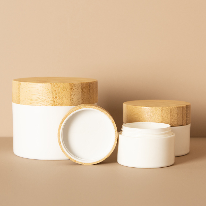 Custom 15g 30g 50g 100g Empty White Cream Packaging Jar PP Plastic Body Butter Containers with Bamboo Lid Custom 15g 30g 50g 100g Empty White Cream Packaging Jar PP Plastic Body Butter Containers with Bamboo Lid