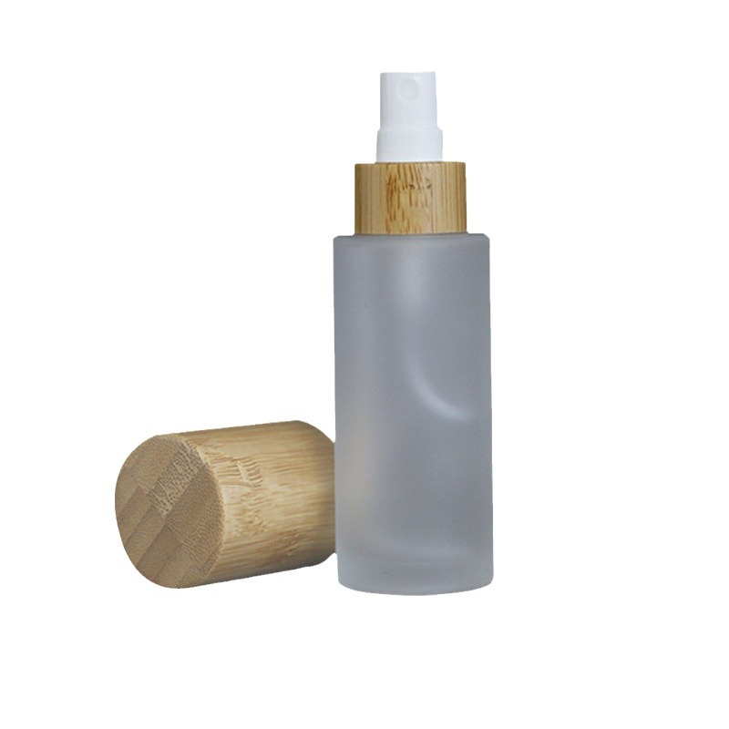 Wholesale Custom 30ml Round clear Glass Cosmetic Perfume Mist Spray Bottle with Bamboo Cap for Personal Care Wholesale Custom 30ml Round clear Glass Cosmetic Perfume Mist Spray Bottle with Bamboo Cap for Personal Care