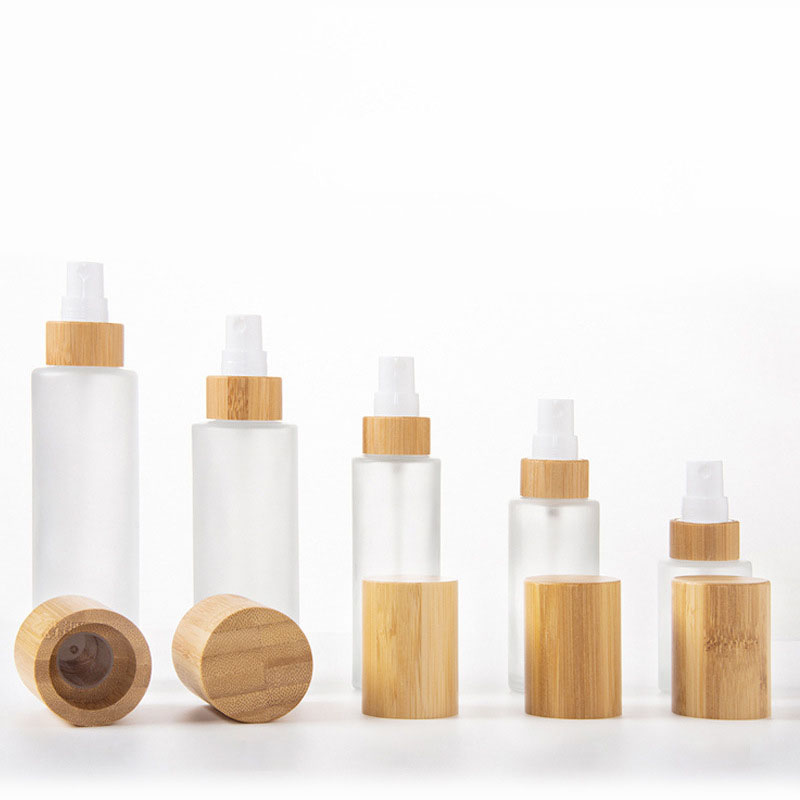 Wholesale Custom 30ml Round clear Glass Cosmetic Perfume Mist Spray Bottle with Bamboo Cap for Personal Care Wholesale Custom 30ml Round clear Glass Cosmetic Perfume Mist Spray Bottle with Bamboo Cap for Personal Care