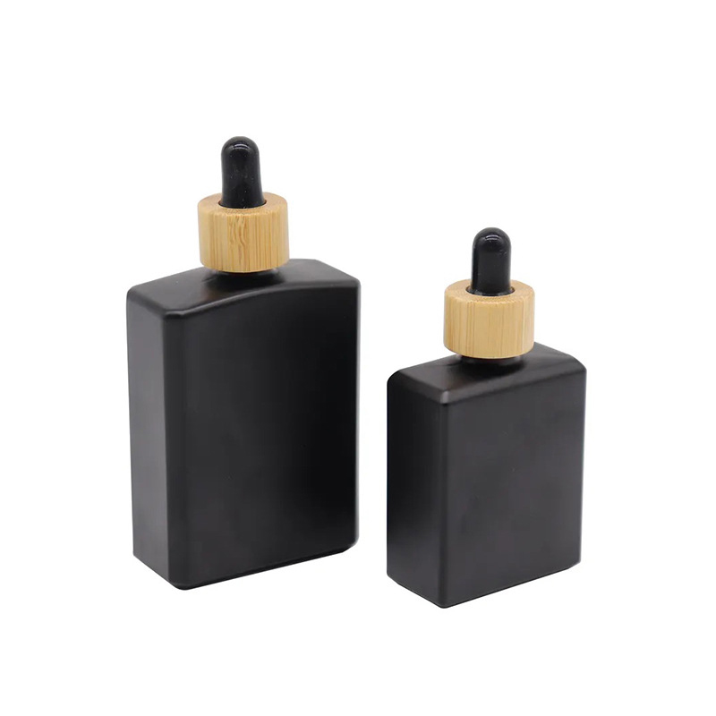 Custom Square Flat Shoulder Boston Serum Perfume Oil 30ml 1oz Matter Black Glass Bamboo Dropper Bottles Custom Square Flat Shoulder Boston Serum Perfume Oil 30ml 1oz Matter Black Glass Bamboo Dropper Bottles