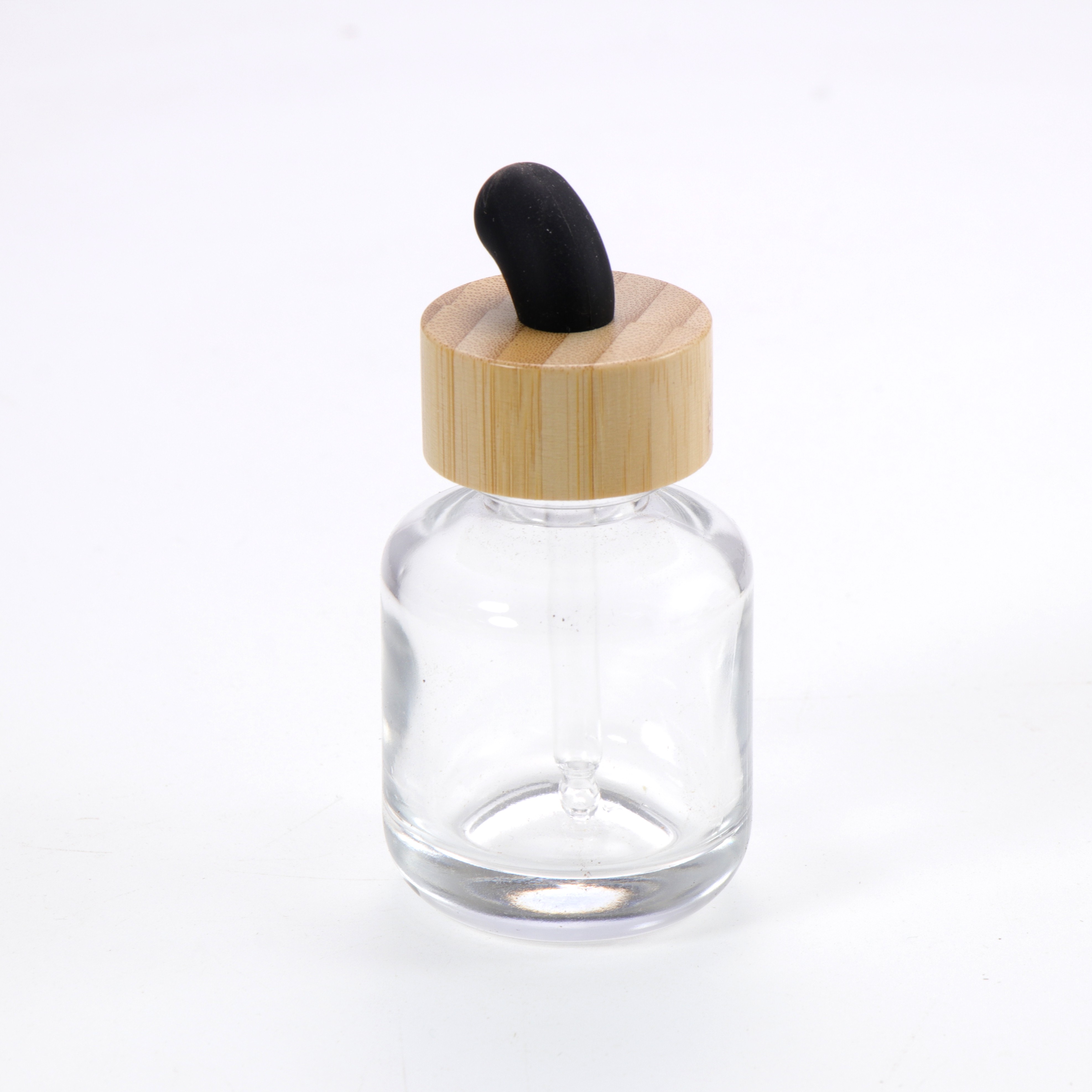 Bamboo-capped dropper bottle (15ml/30ml/50ml) — Sophisticated, leak-proof design; suitable for home use, travel, and beauty care.