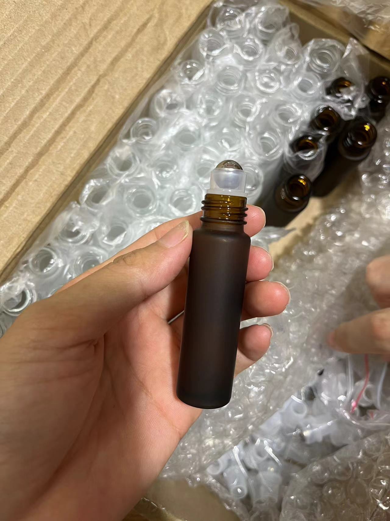 Amber Glass Roller Bottle 5ml 10ml with Magnetic Black Walnut Wooden Cap Custom Logo Essential Oil Skincare Packaging Container Amber Glass Roller Bottle 5ml 10ml with Magnetic Black Walnut Wooden Cap Custom Logo Essential Oil Skincare Packaging Container