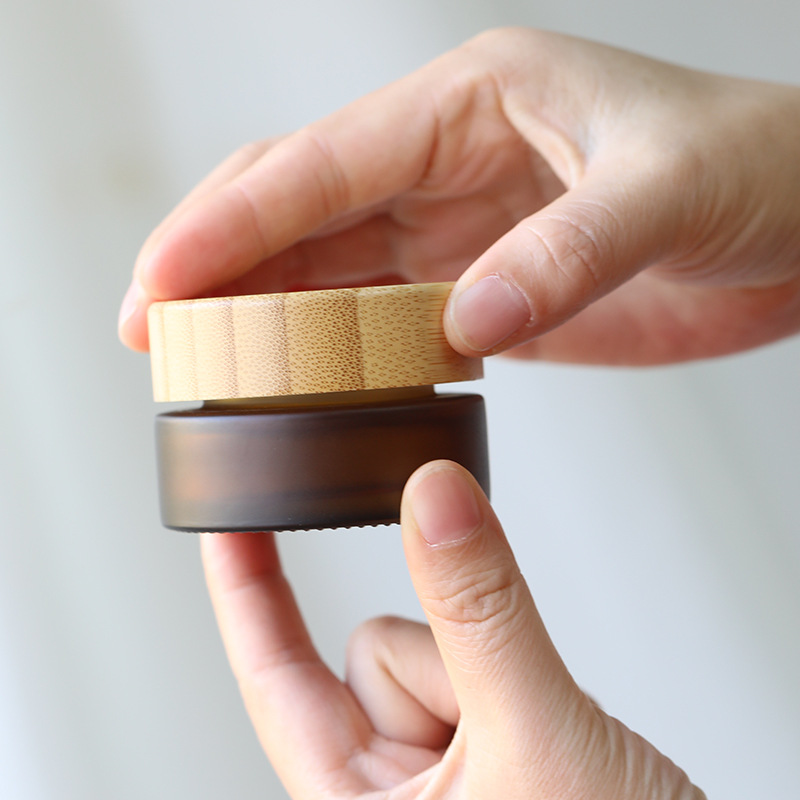 Custom Eco Friendly Frosted Amber Glass Cosmetic Packaging Set Wholesale Luxury Cream Jar Lotion Bottle with Natural Bamboo Lid