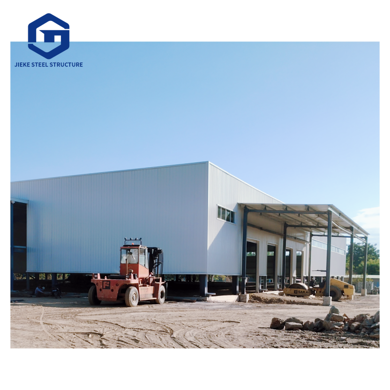 A modern steel structure warehouse with high compressive strength, hurricane-resistant, and waterproof features, suitable for factory use.
