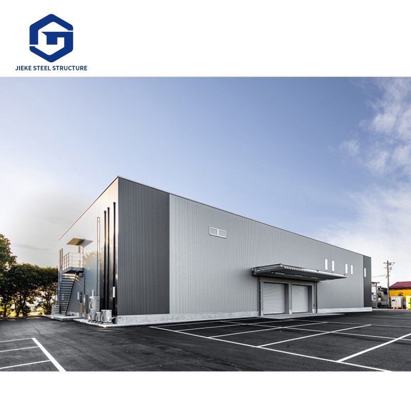 A modern steel structure warehouse with high compressive strength, hurricane-resistant, and waterproof features, suitable for factory use.