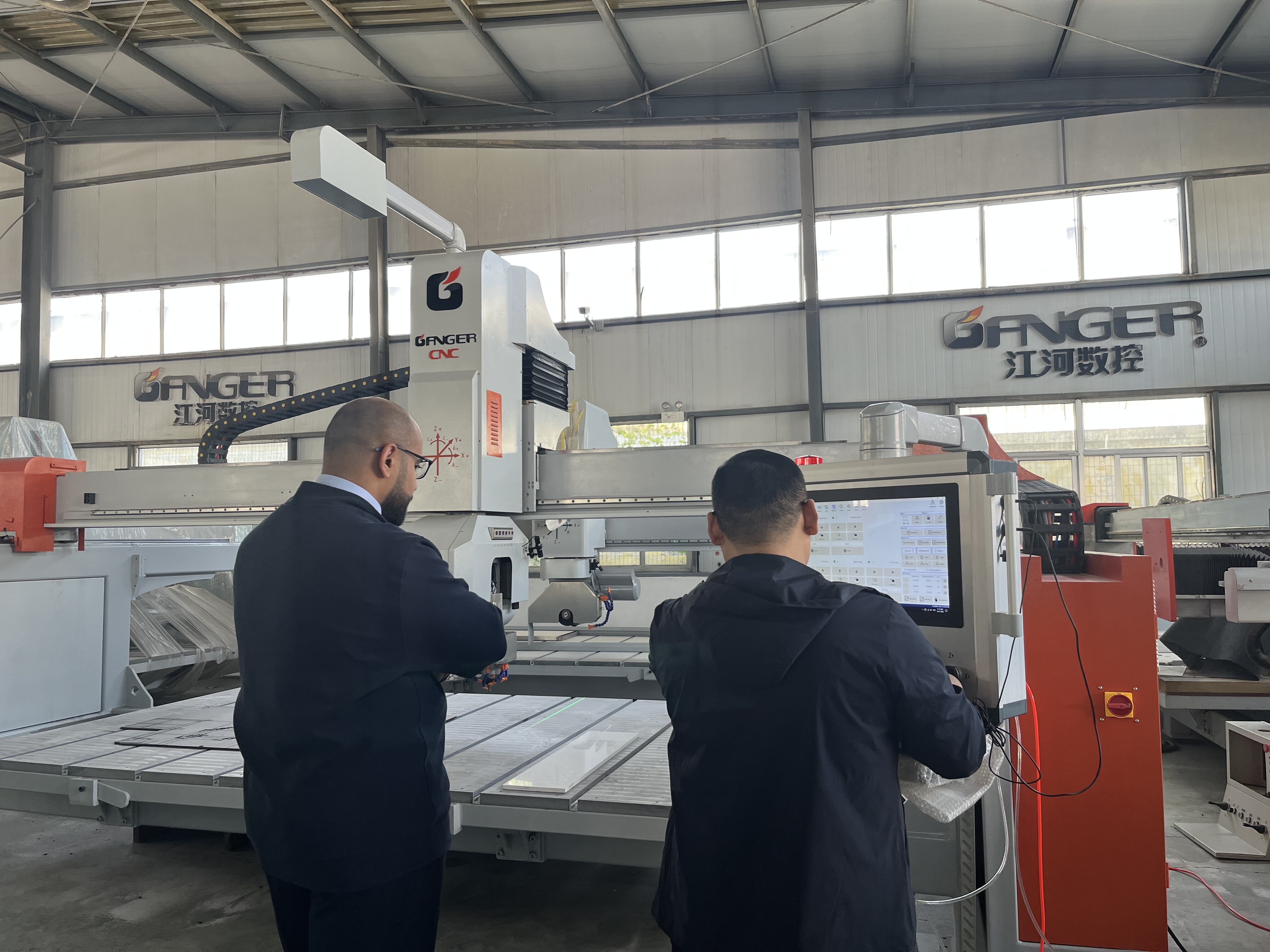 Oman client visit Ganger cnc and inspects 5 axis bridge saw