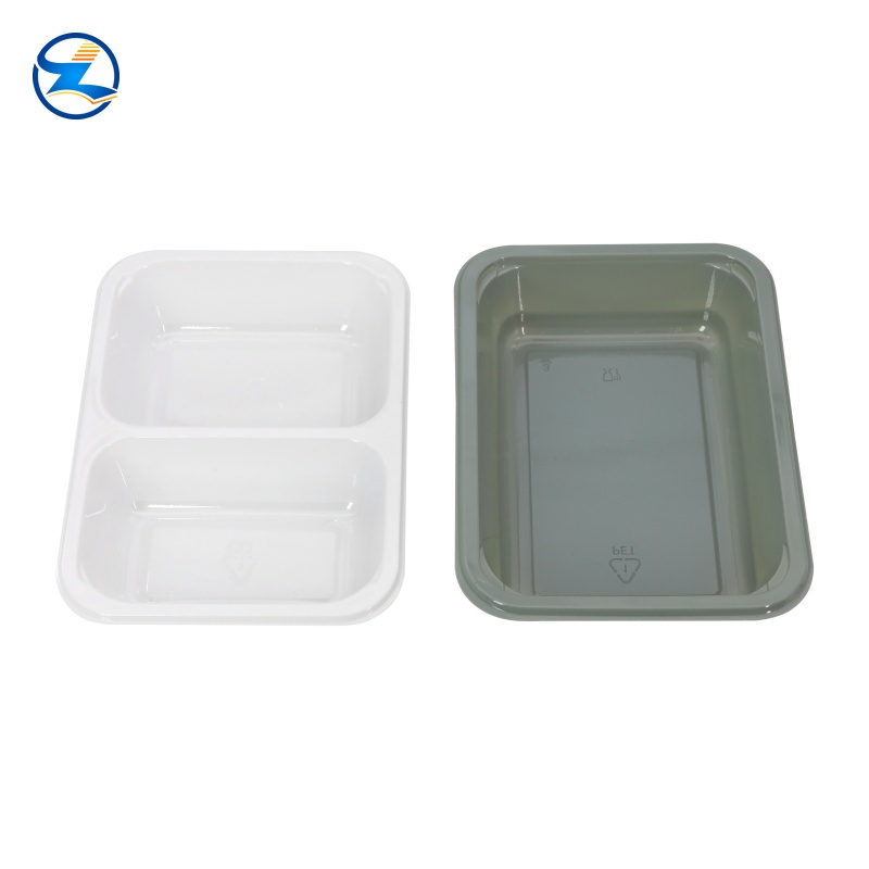yellow PLA tray, black and white CPET tray, grey PP tray