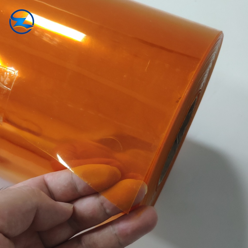 Transparent orange rigid PVC film for pharmaceutical blister packaging
