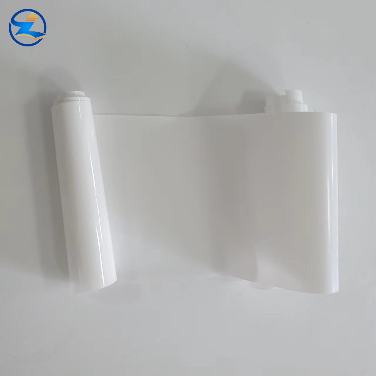 Opaque white heat-sealable PET lidding film