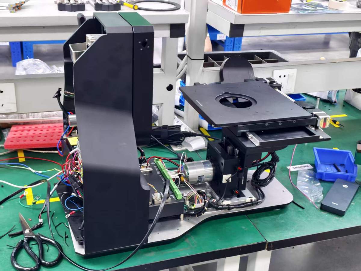 Precision rotary actuator for microscope