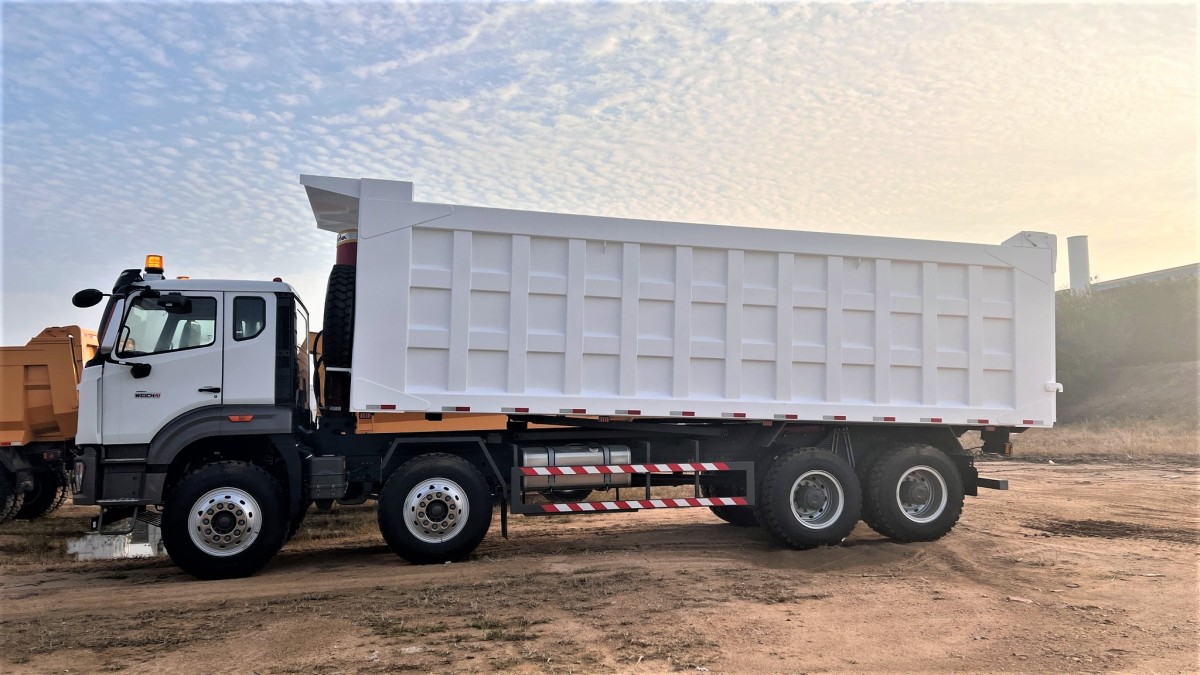 Howo NX 400HP 8x4 dump truck side view large capacity body