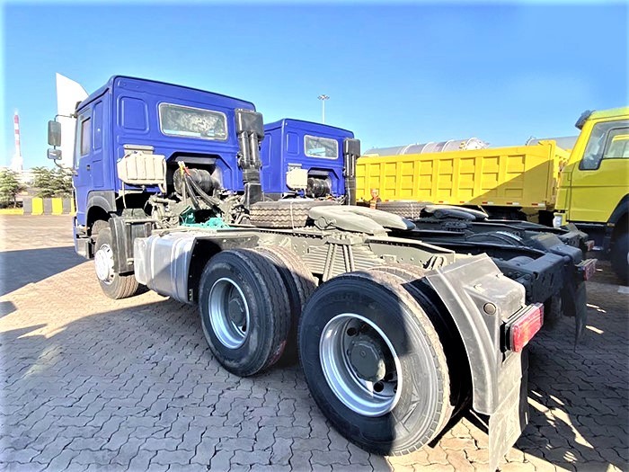 HOWO T7H 430HP 6x4 Tractor Truck rear 3/4 view showing drivetrain and reinforced frame