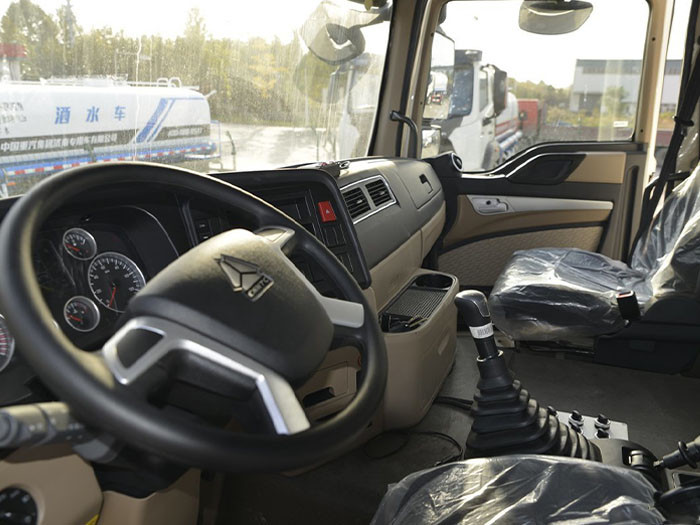 HOWO T7H 440HP 6x4 water tank truck cabin interior with ergonomic layout and driver comfort