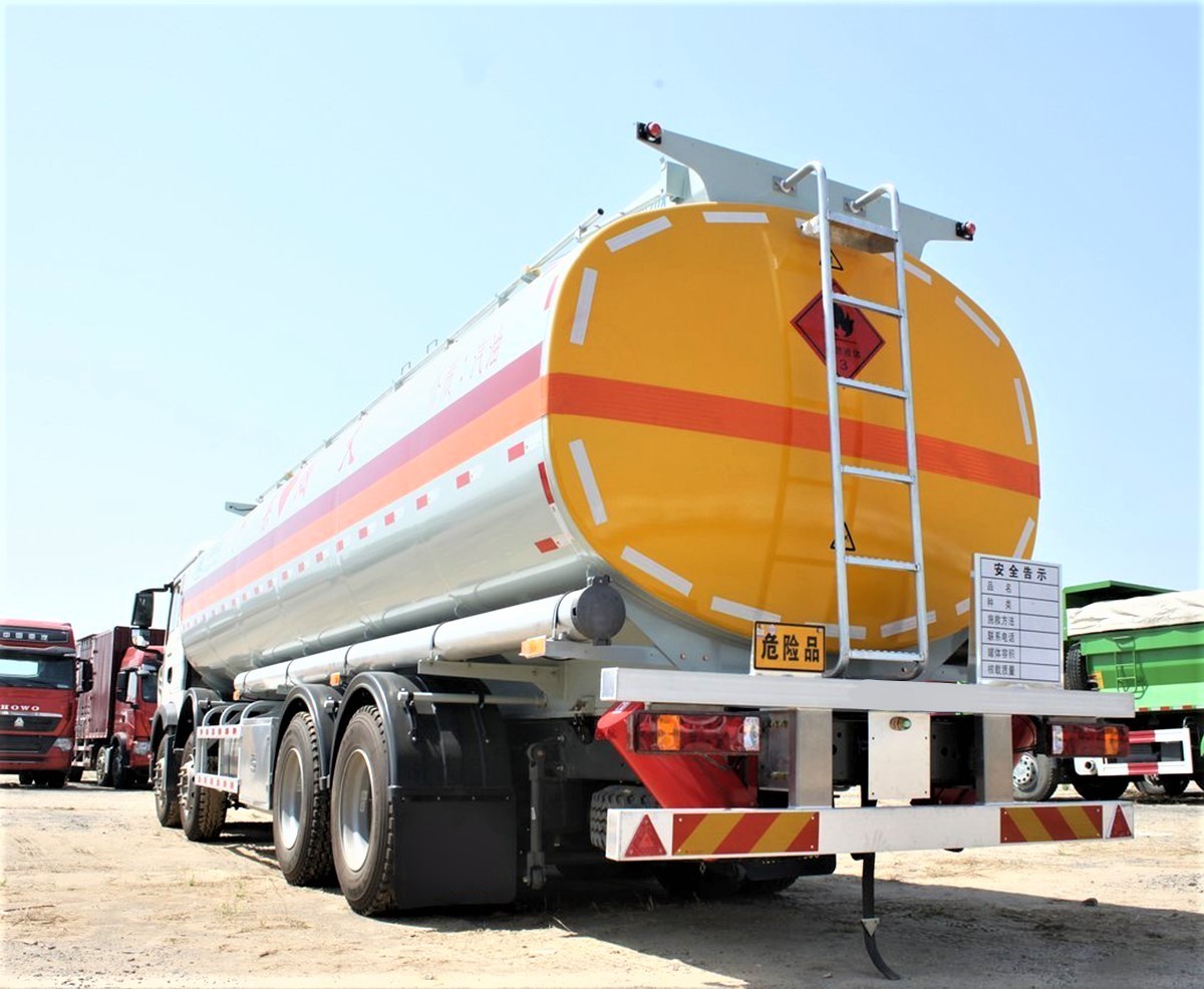 HOWO 340HP 8x4 fuel tanker truck rear three quarter view showing rear valves and heavy duty tank structure