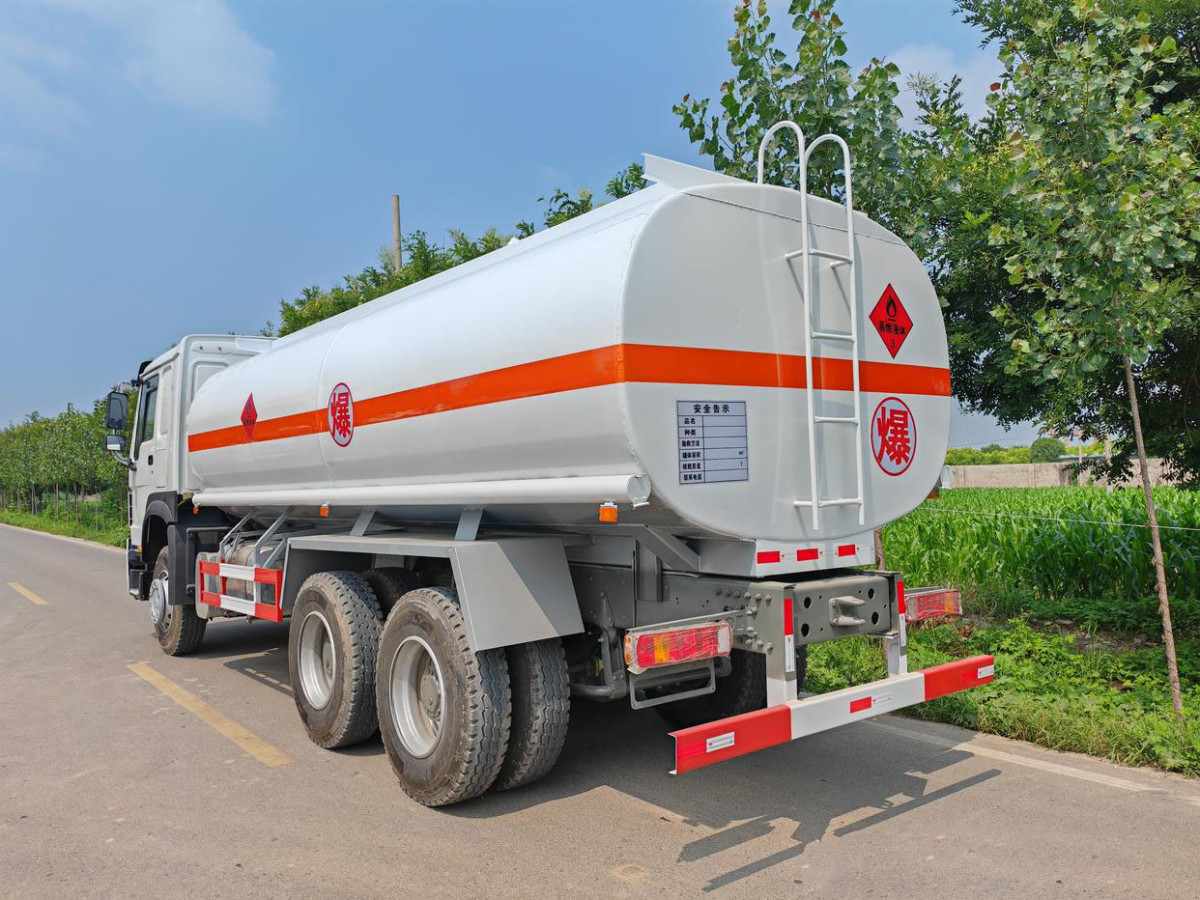 HOWO 371HP 6x4 fuel tanker truck rear three quarter view showing fuel outlet system