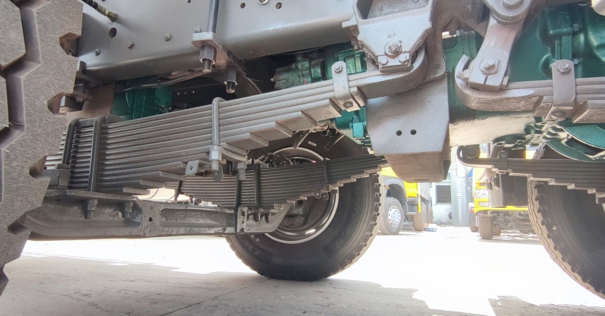 HOWO 8x4 heavy duty fuel tank truck chassis showing reinforced frame and multi-axle layout