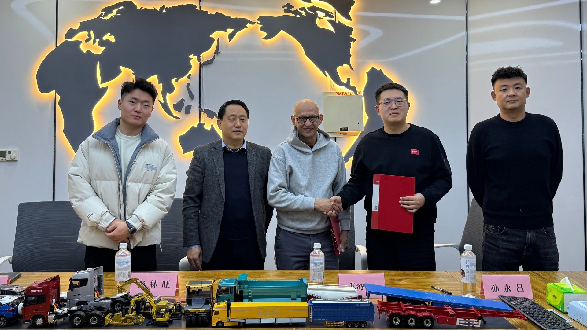ZW Group Jinan headquarters factory visit: Mr. Kaycee inspecting semi-trailer production workflows and quality assurance for the West African market.