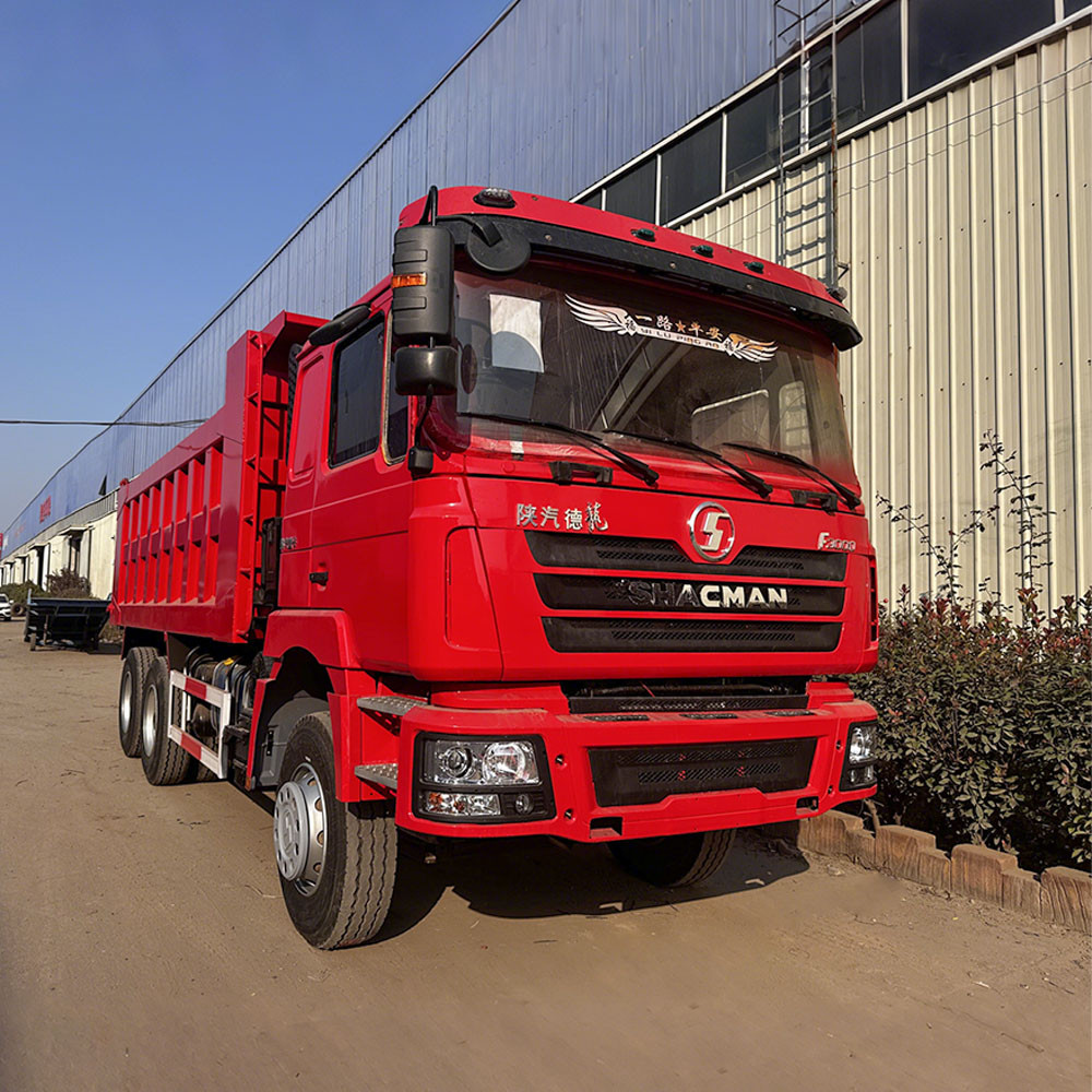 Shacman F3000 6x4 dump truck front three quarter view highlighting dump body and cab