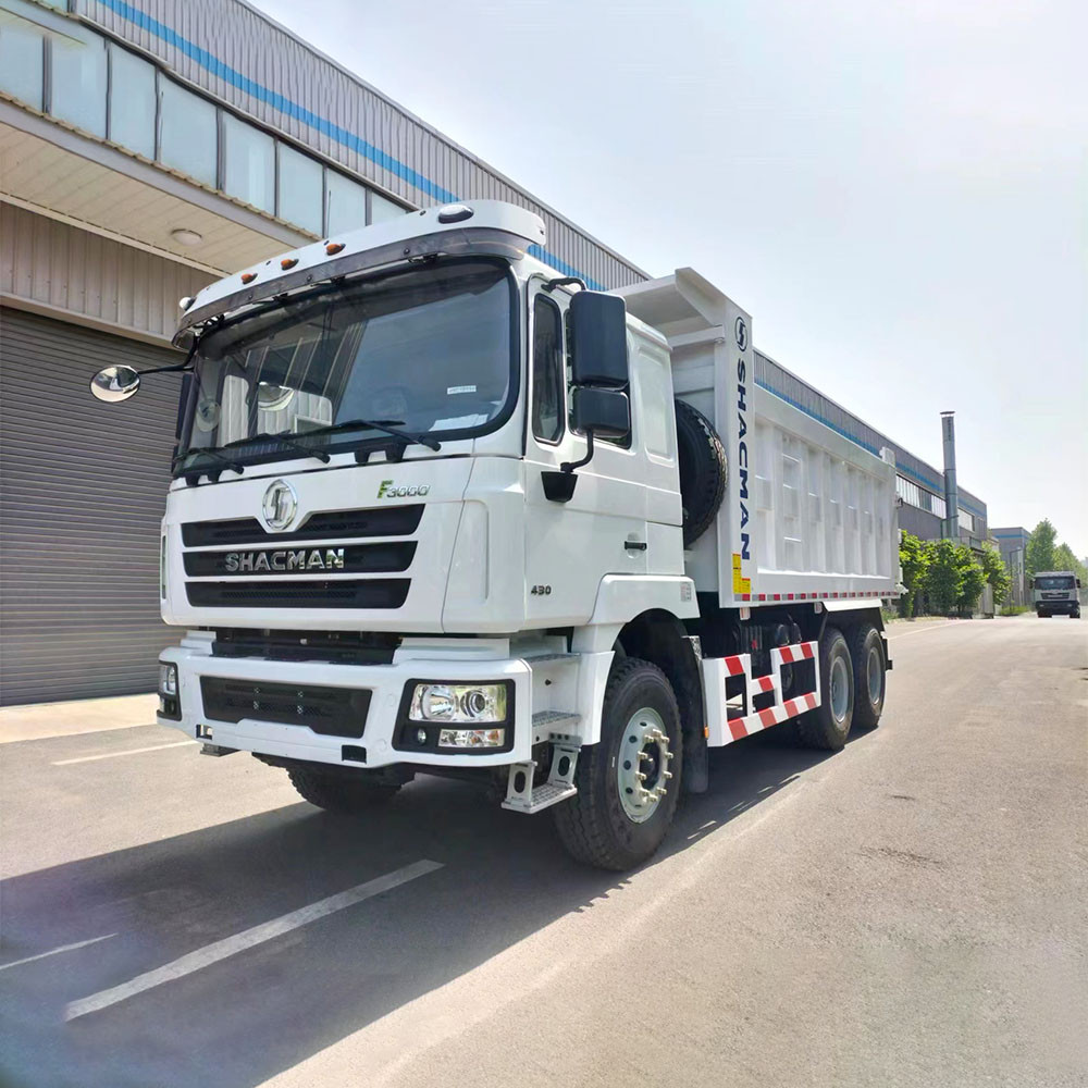 Shacman F3000 6x4 430HP dump truck front three quarter view highlighting dump body and cab