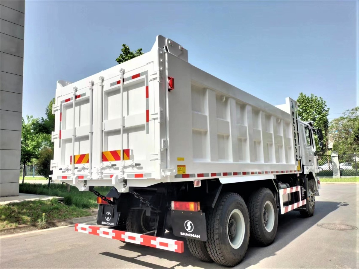 Shacman F3000 6x4 430HP dump truck rear three quarter view showing dump body tilt and rear frame