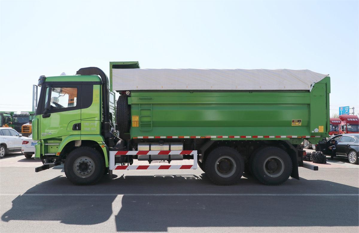 Shacman X3000 6x4 heavy duty dump truck side view showing dual rear axle configuration and cargo box