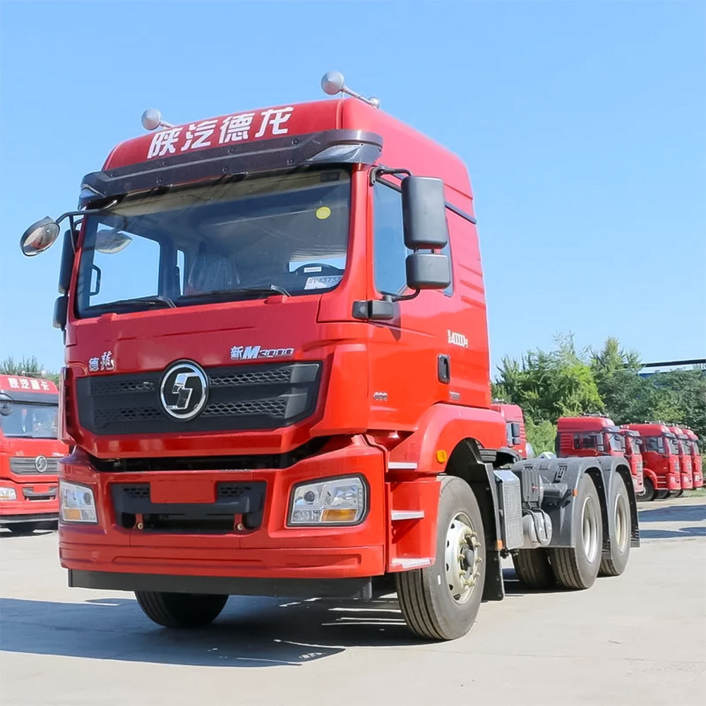 Shacman M3000 6x4 heavy duty tractor truck front three quarter view highlighting cab design and chassis layout