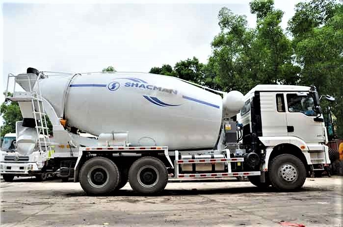 Shacman H3000 6x4 heavy duty concrete mixer truck side view showing mixer drum and dual rear axle configuration