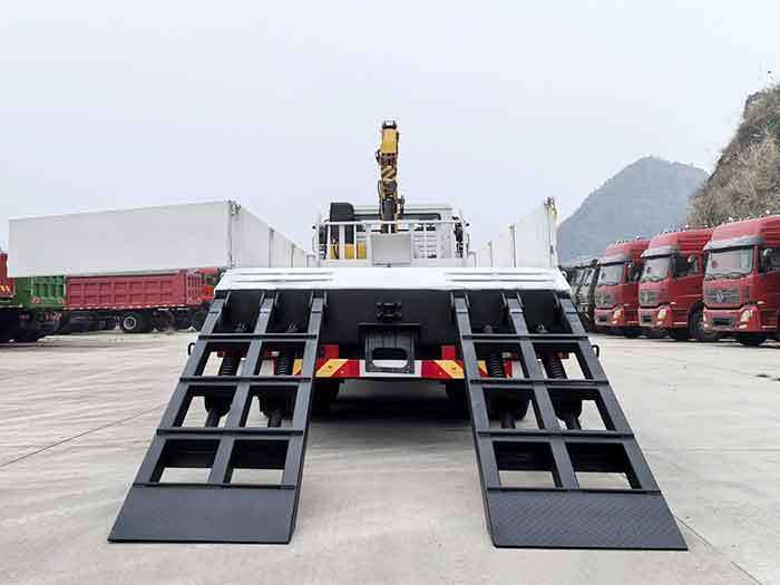 Shacman F3000 8x4 heavy duty truck mounted crane rear view showing crane base and reinforced frame