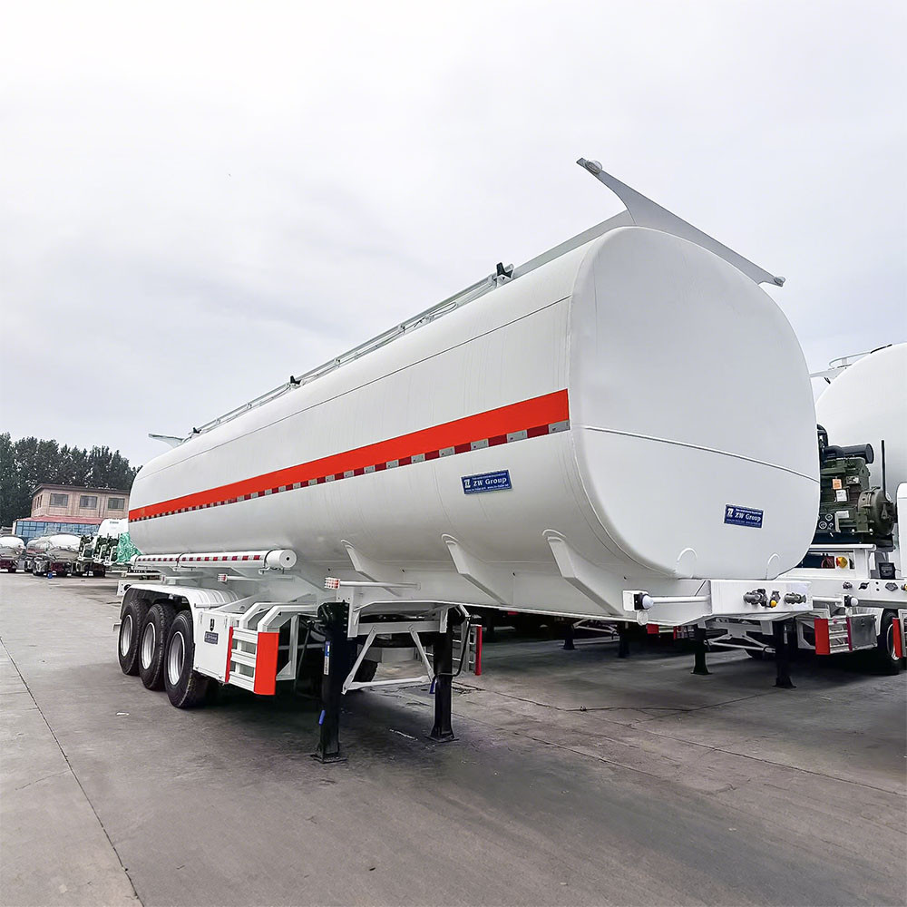 3 axle carbon steel fuel tanker semi trailer front three quarter view highlighting tank body and axle configuration