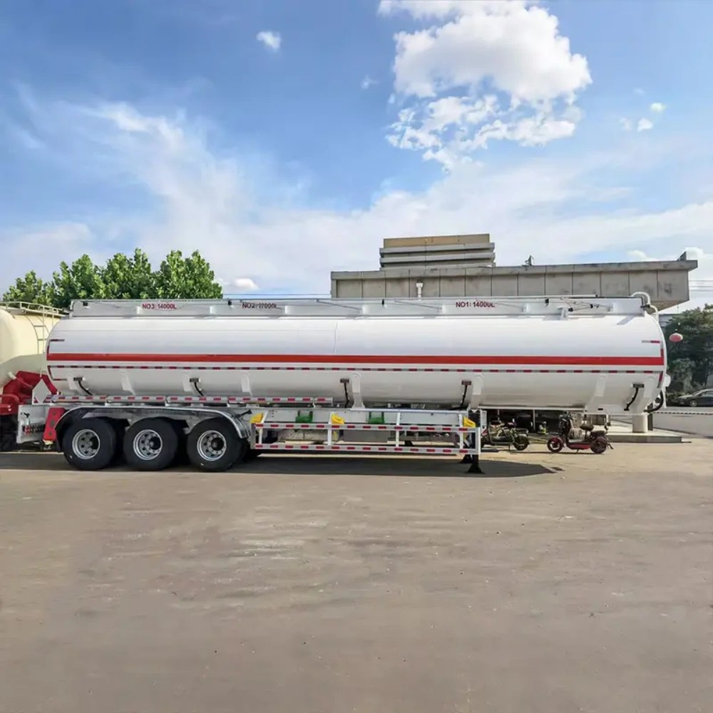3 axle 45,000L carbon steel fuel tanker semi trailer side view showing durable carbon steel tank and suspension system