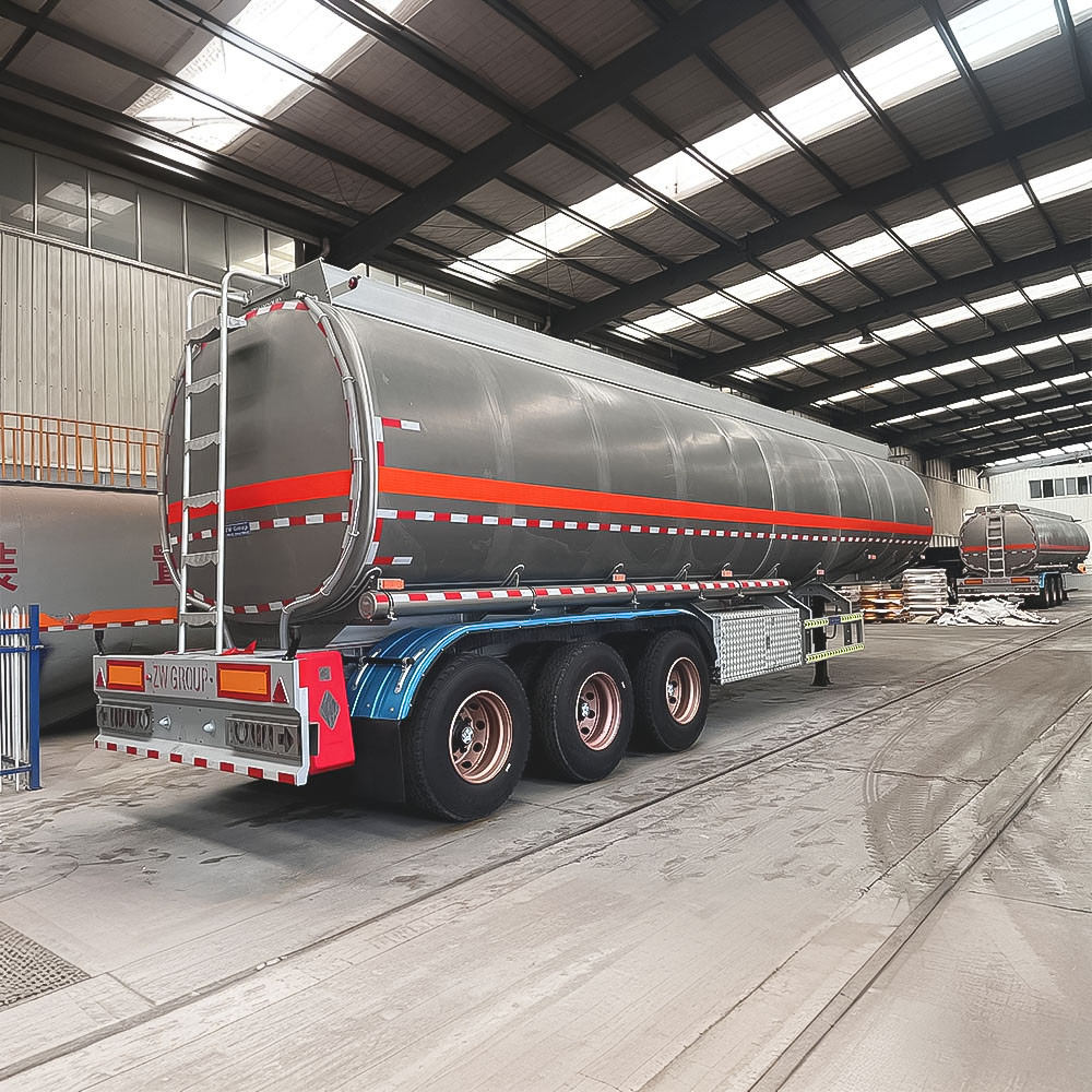 3 axle 42,000L carbon steel fuel tanker semi trailer rear three quarter view showing discharge system and rear platform