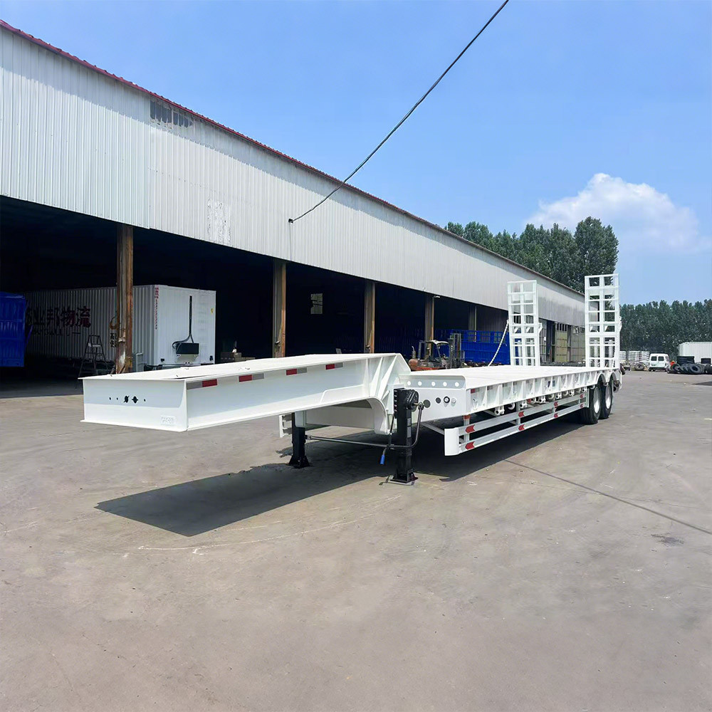 2 axle 40 ton lowbed trailer front three quarter view highlighting low deck height and axle layout