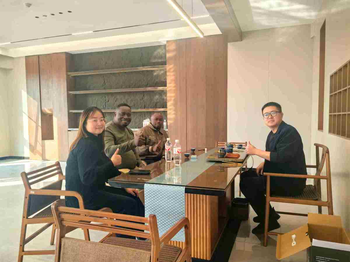 ZW Group CEO Ivan Sun (Sun Yongchang), Foreign Trade Manager, and Congo Clients Enjoying Tea Together at ZW Group Tea Room
