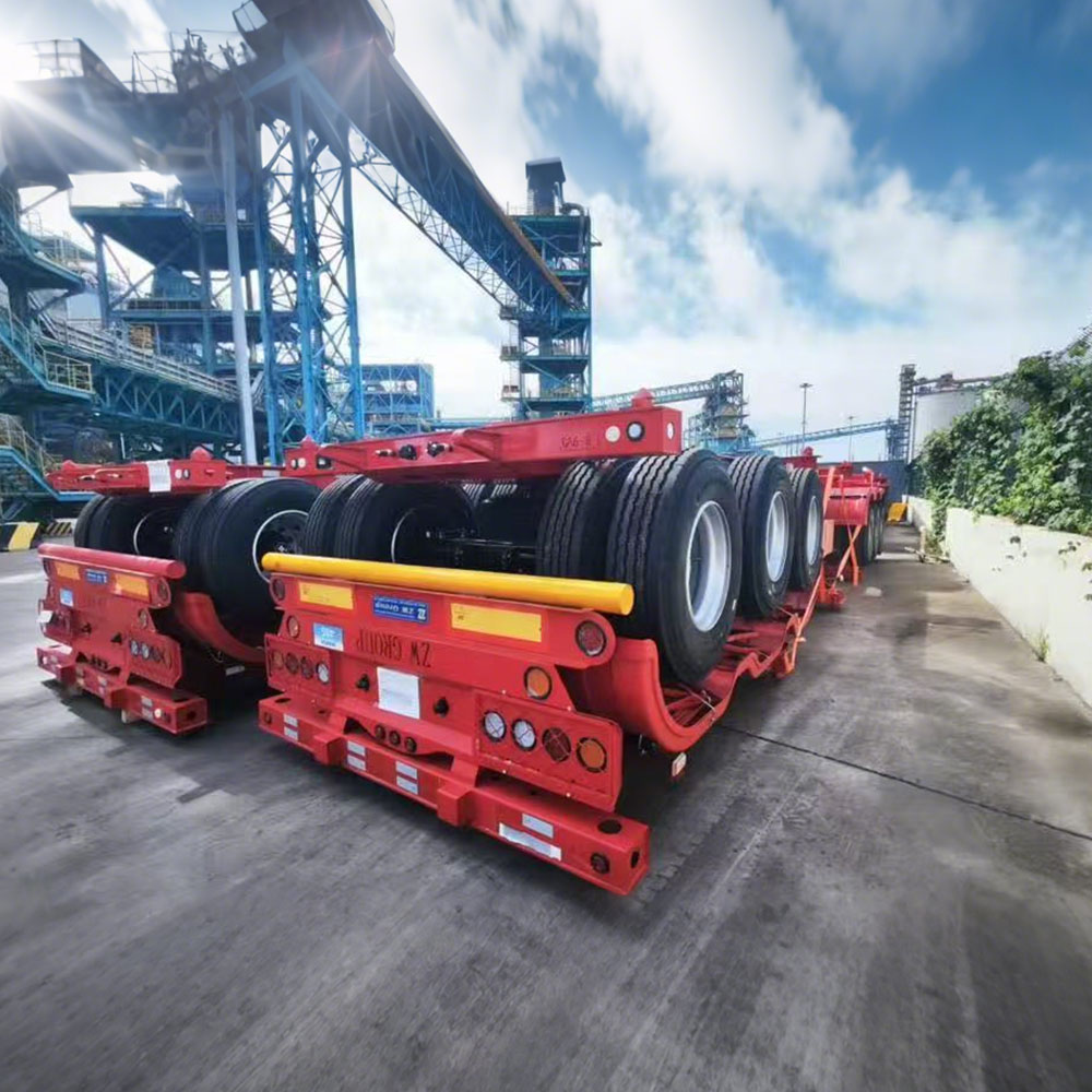 ZW Group flatbed semi trailers at port: heavy duty trailers lined up for international shipping.