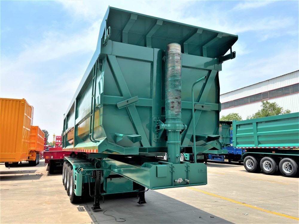 4 axle 35CBM tipper semi trailer rear view showing hydraulic tipping system and safety features