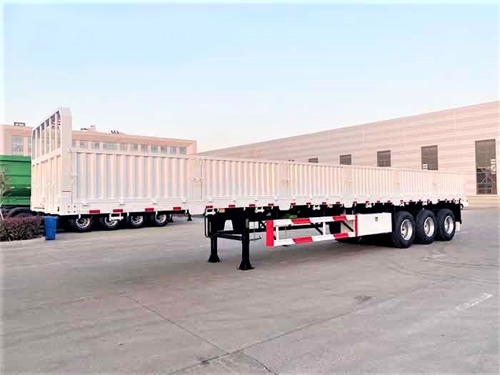 3 axle side wall cargo trailer side view showing long cargo platform and removable side walls