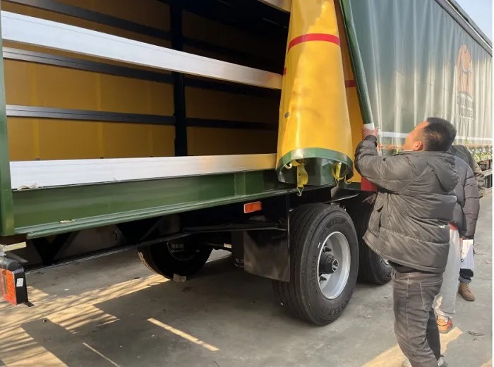 3 axle curtain cargo trailer curtain side detail showing sliding system for easy loading/unloading