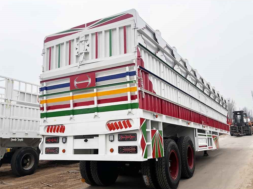 2 axle 40T box semi trailer rear three quarter view showing rear cargo doors and reinforced frame