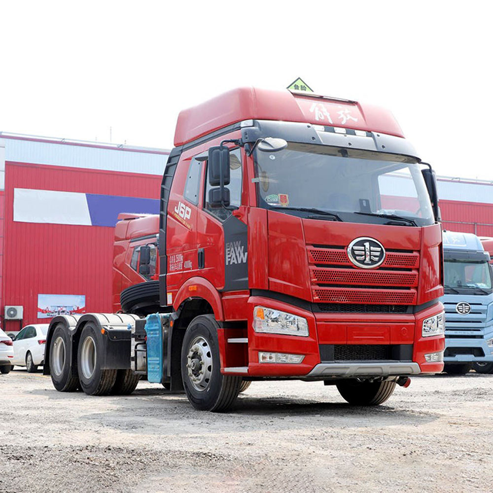 FAW J6P 460HP 6×4 tractor truck front three quarter view highlighting grille, headlights and cabin design