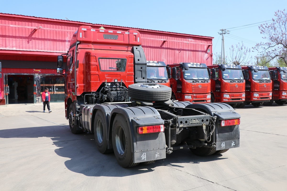 FAW J6P 420HP 6×4 tractor truck rear three quarter view showing chassis and fifth wheel coupling