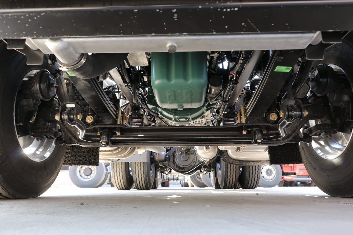 FAW J6P 6×4 tractor truck chassis detail showing heavy duty frame, suspension and axle layout for stable long haul transport