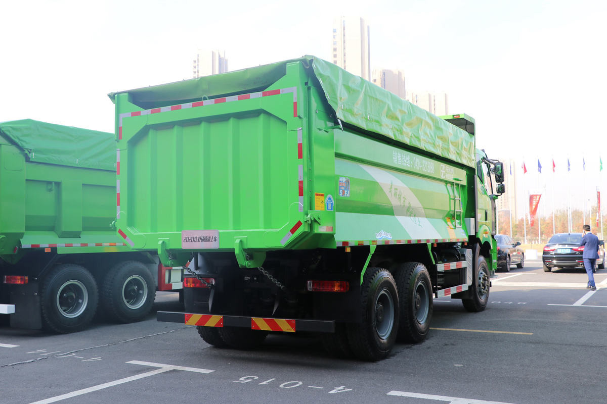 FAW J6P 6×4 dump truck rear three quarter view showing tailgate and hydraulic lifting system