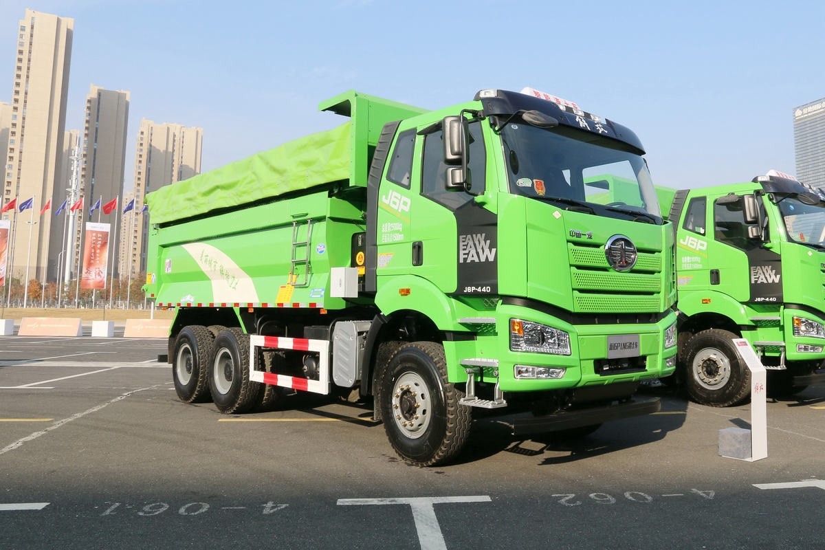 FAW J6P 6×4 dump truck front three quarter view highlighting cabin, axle layout and dump body