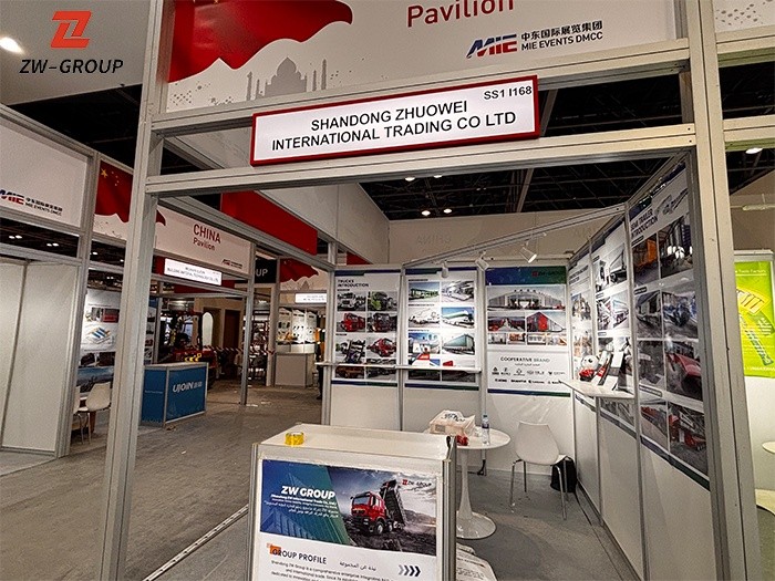 ZW Group exhibition stand SS1 I168 featuring semi-trailers and heavy-duty truck product displays.