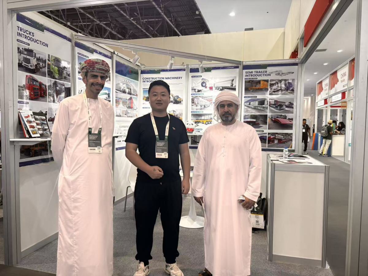 ZW Group representative with clients in traditional Middle Eastern attire at Big 5 Global Dubai 2025.