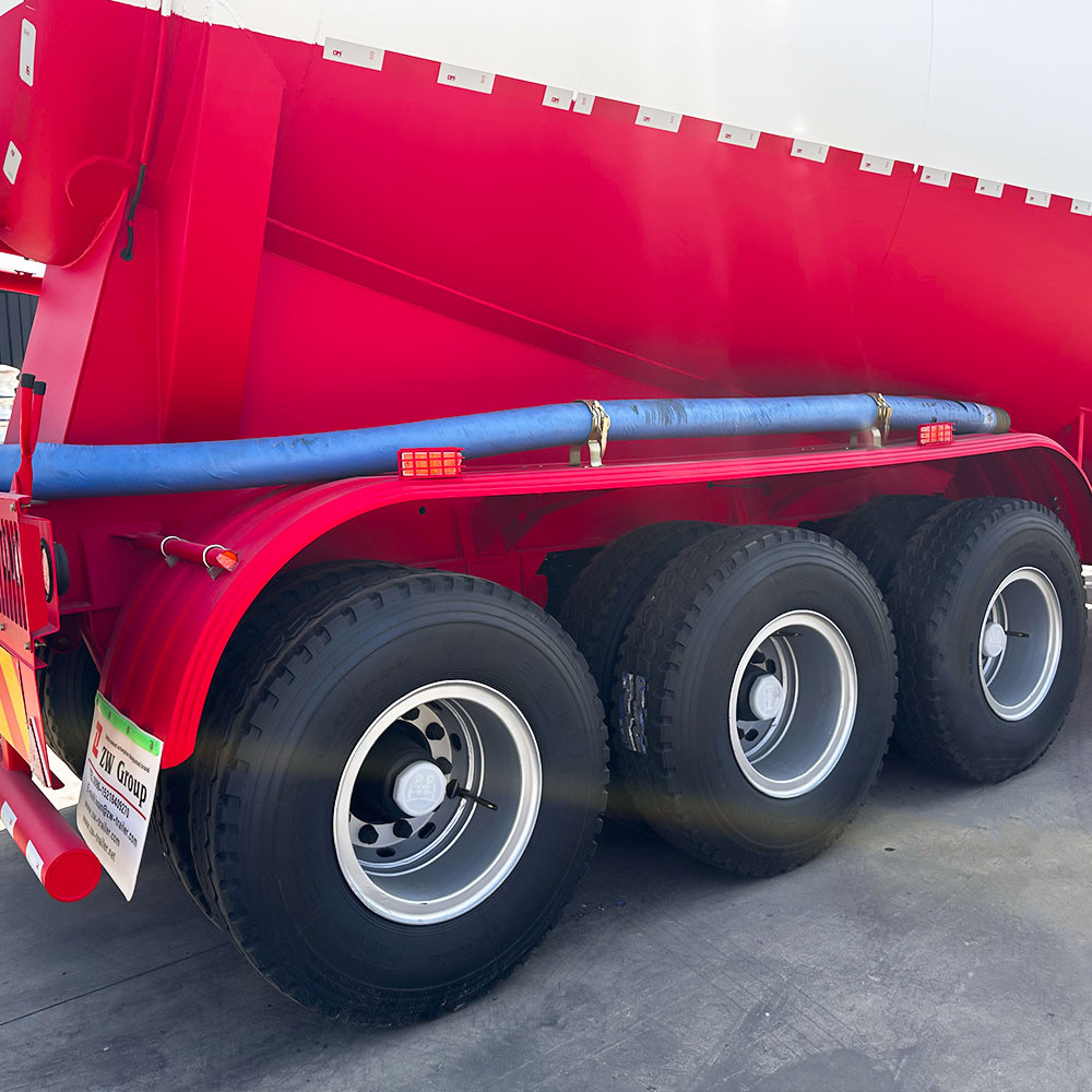 Three axles of powder transport tanker trailer with heavy duty tires
