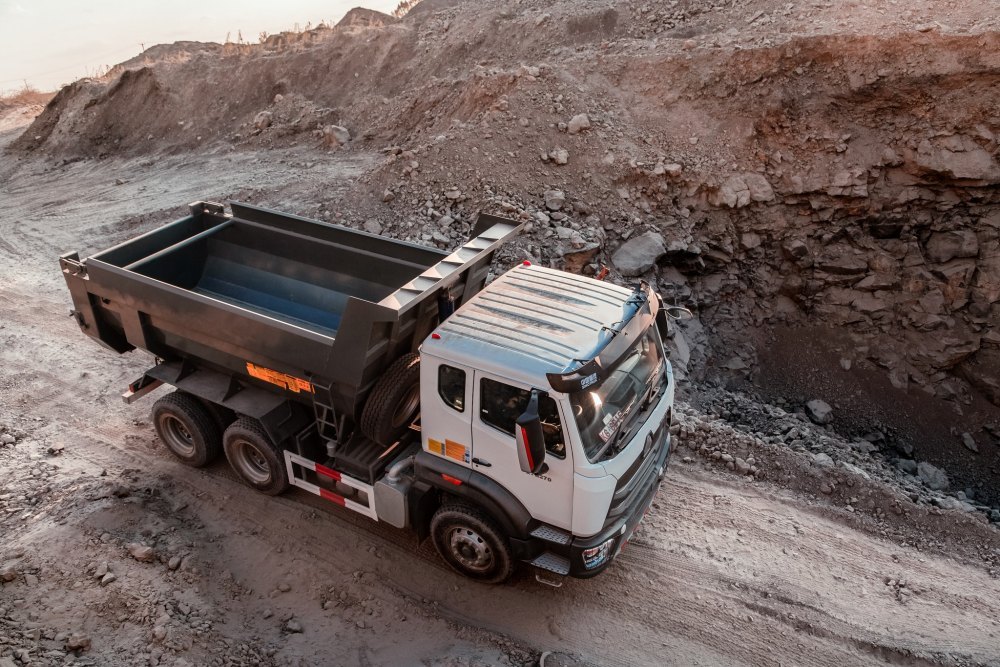 Used heavy duty dump truck operating in harsh mining environment showing rugged workload inspection 616827998_122233551068103395_4561150997033220830_n_副本